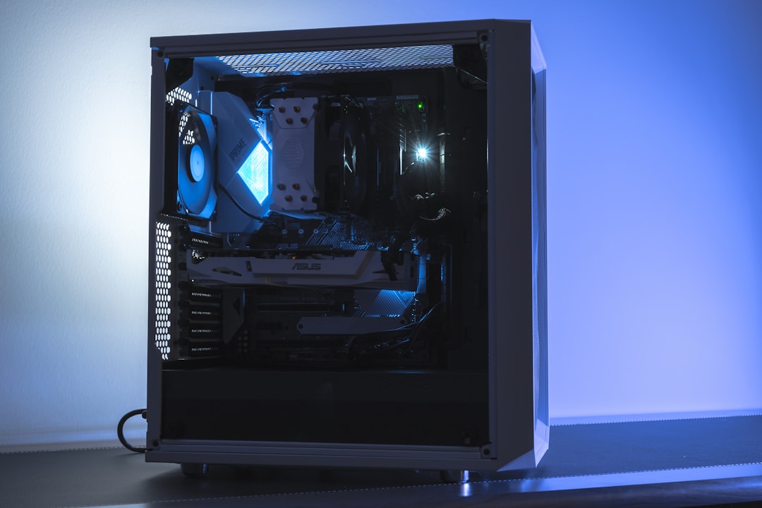 a-computer-with-a-blue-light-5wjhuxkqckc
